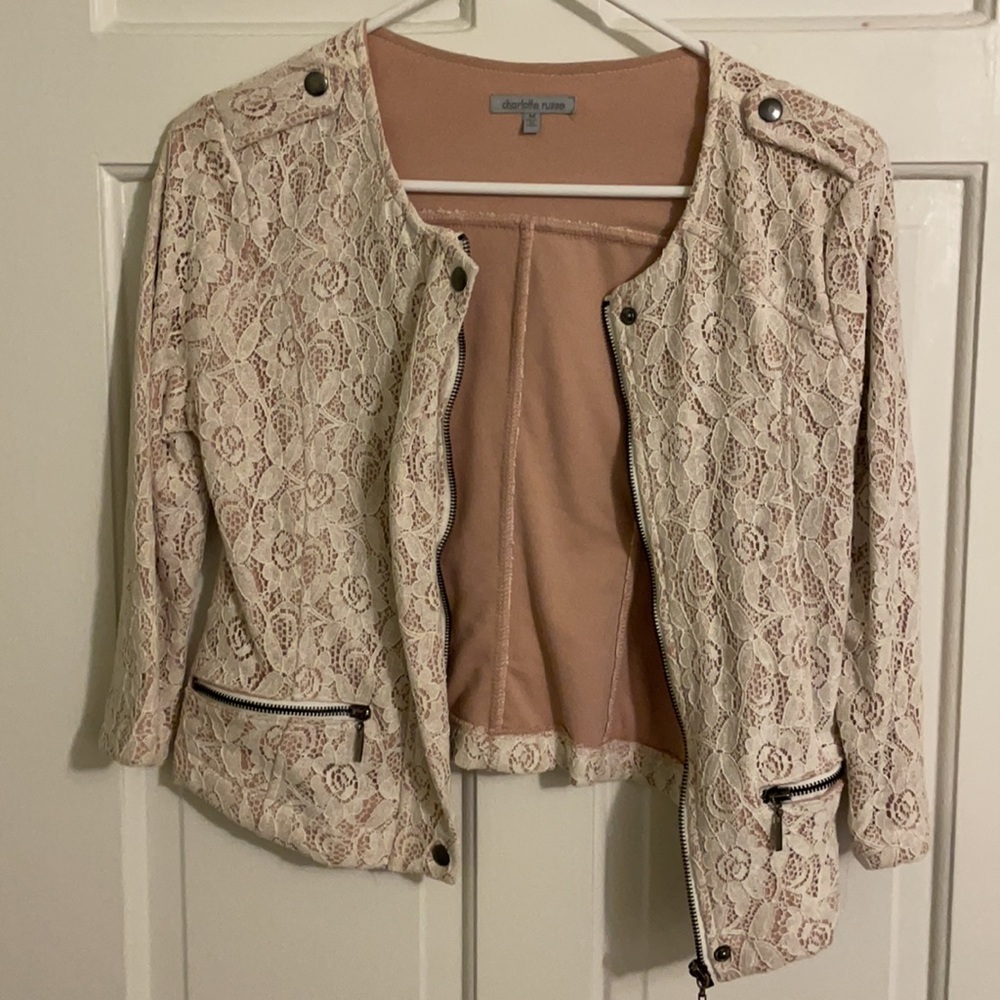 Cream floral blazer.